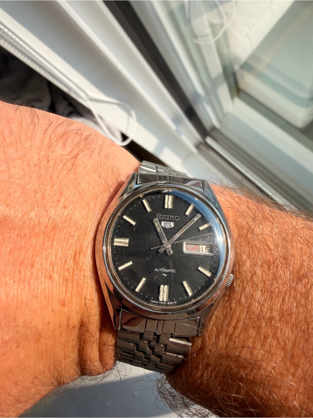 Seiko Men's Silver Case Watch with Black Dial